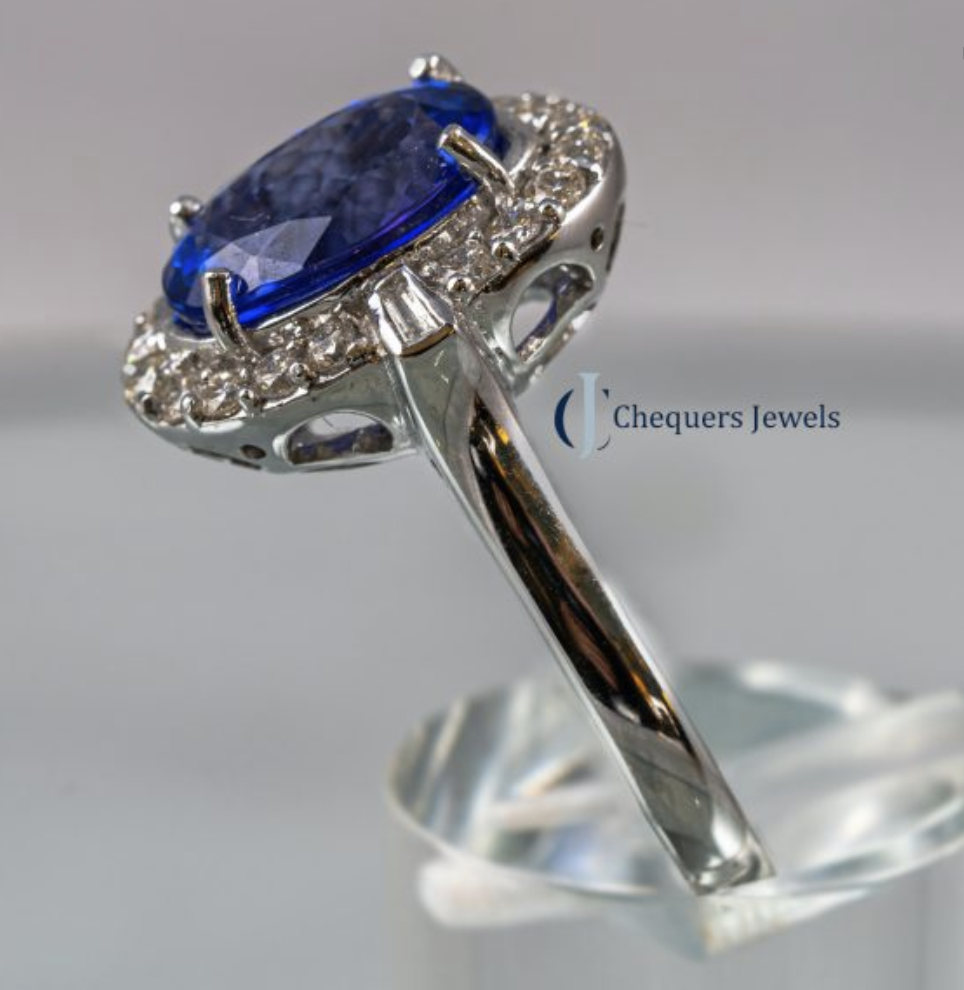 Deep Blue Tanzanite and Diamond Ring