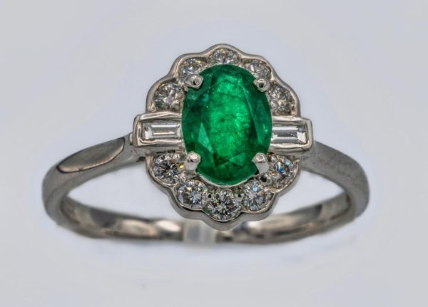 Oval Cut Emerald and Diamond Ring